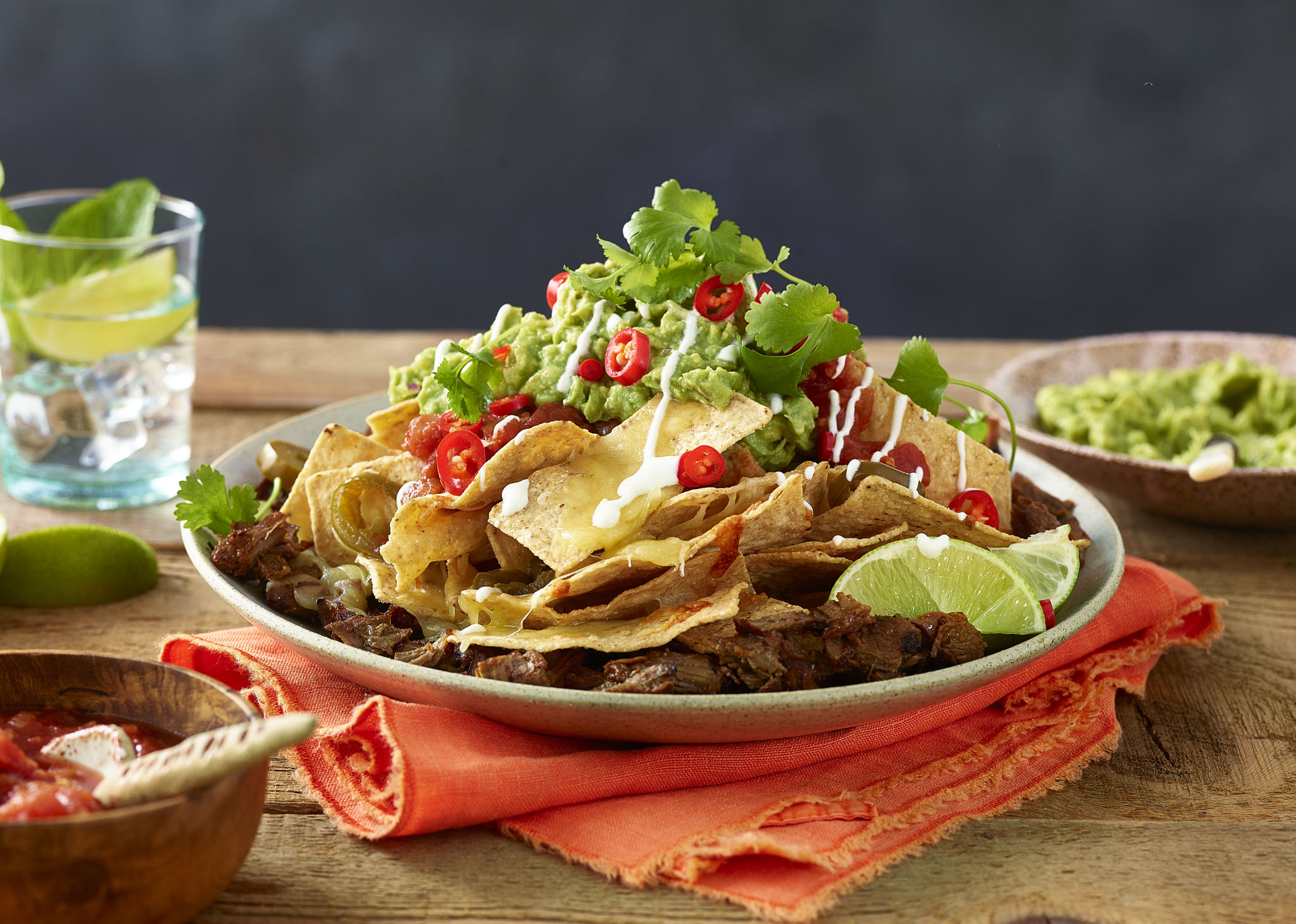 Pulled Beef Nachos with Guacamole, Coriander & Lime Sour Cream