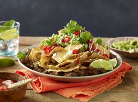 Pulled Beef Nachos with Guacamole, Coriander & Lime Sour Cream