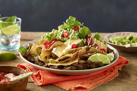 Pulled Beef Nachos with Guacamole, Coriander & Lime Sour Cream